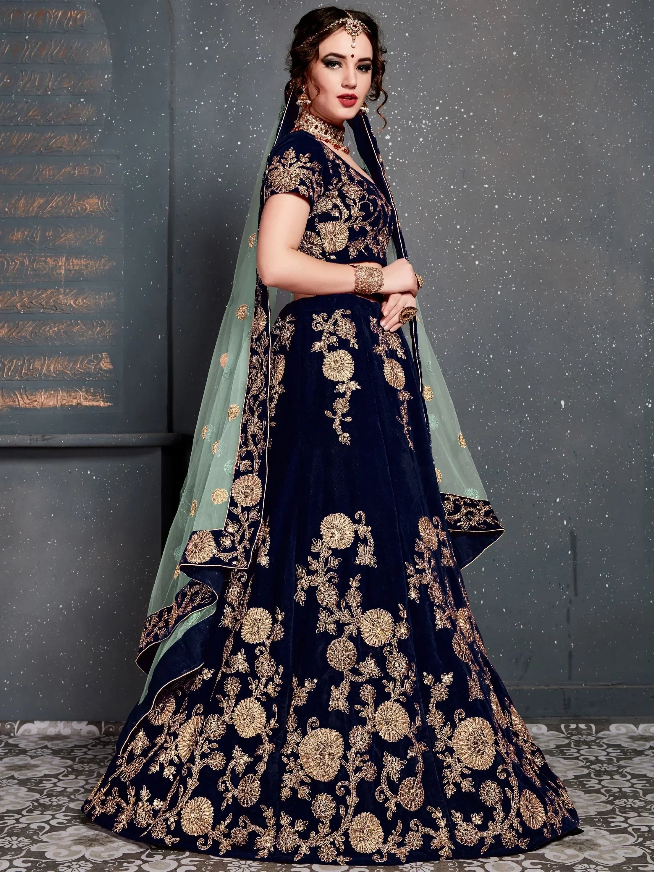 Navy blue velvet lehenga choli with gold floral embroidery and mint dupatta, Indian ethnic wear