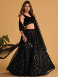 Mesmerizing Black Mirror Work Organza Reception Wear Lehenga Choli