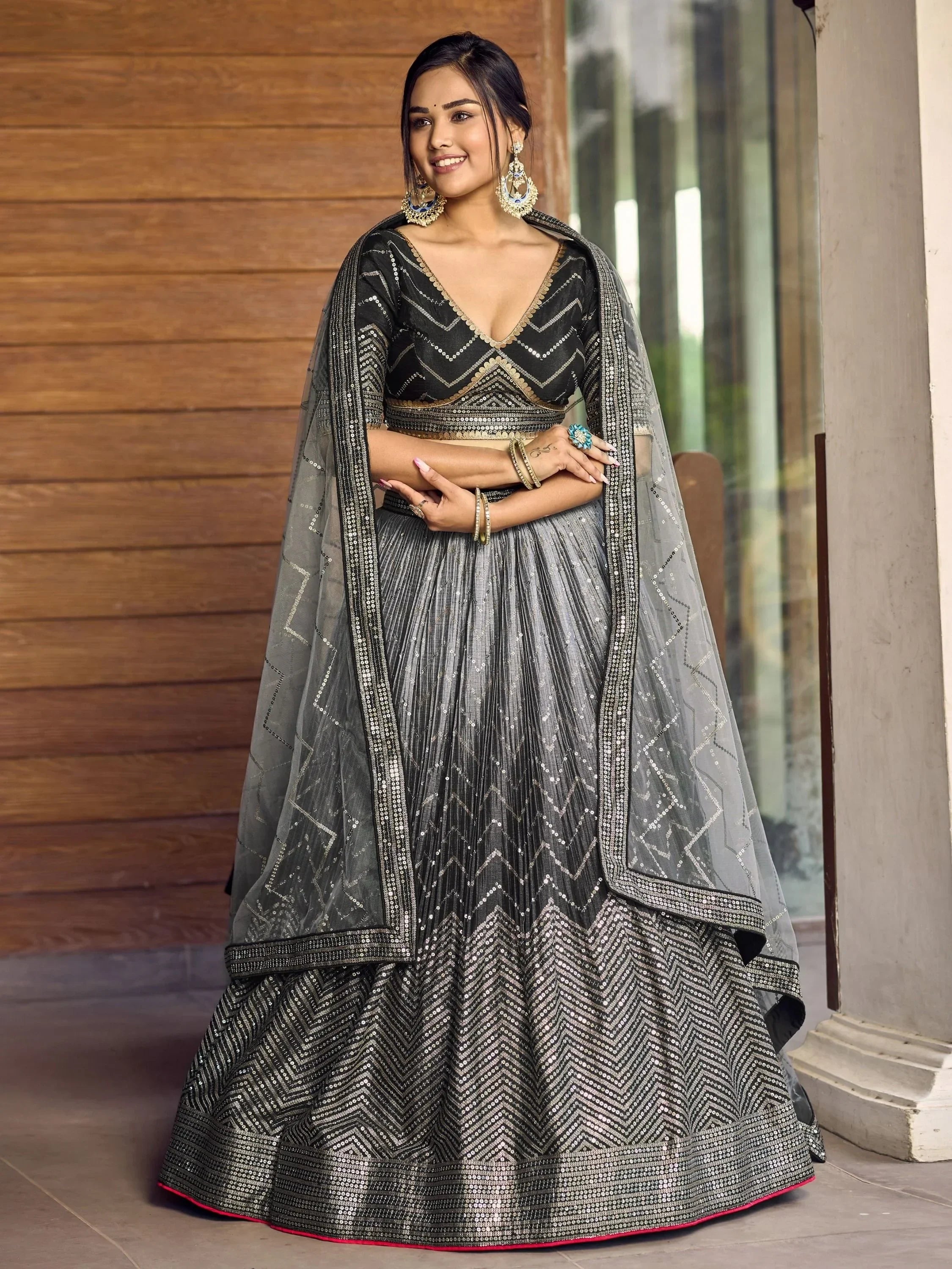 Black and silver sequin lehenga choli with chevron pattern, perfect for Indian ethnic wear events