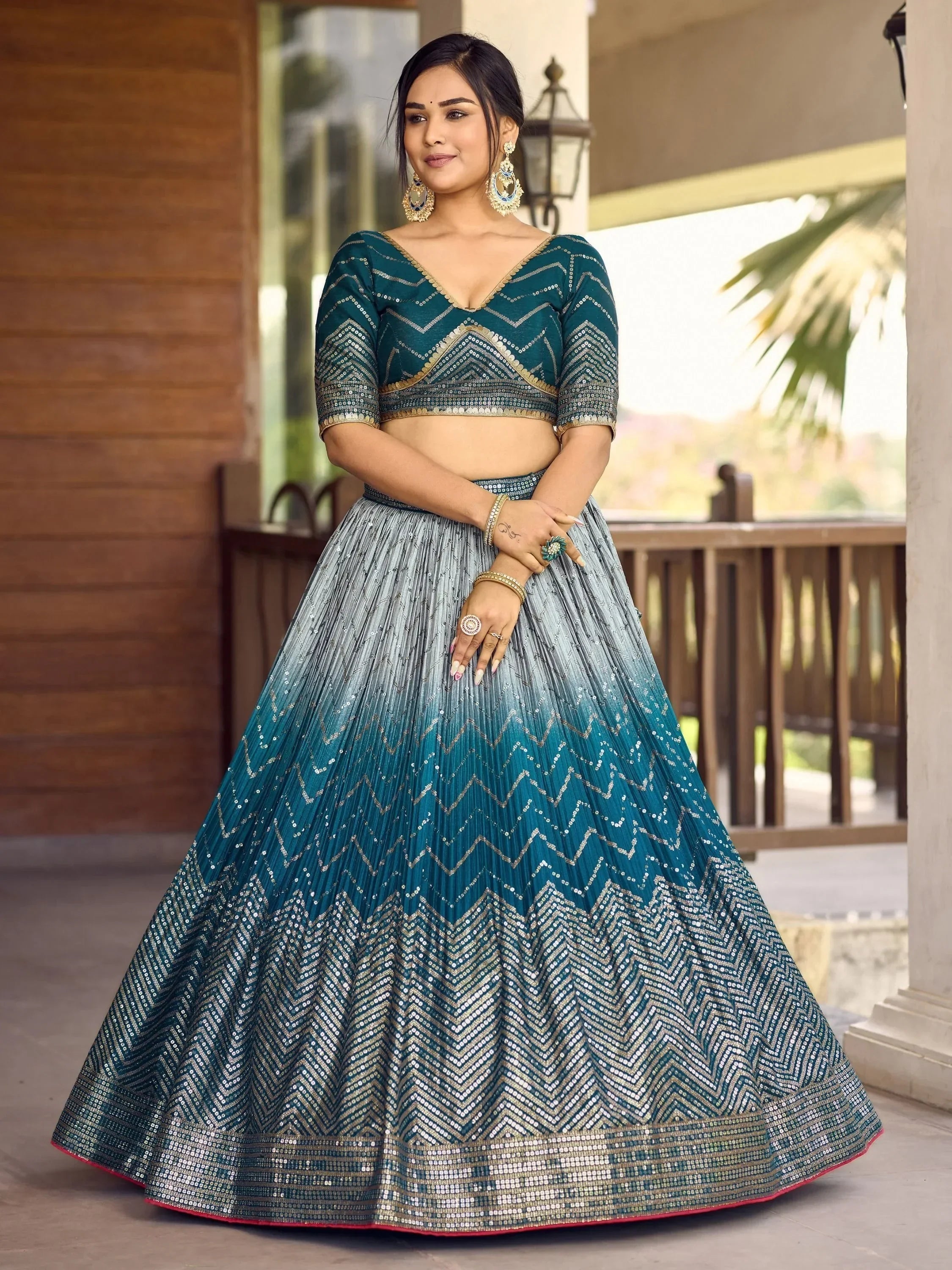 Teal and silver sequin lehenga choli with chevron pattern, perfect for Indian ethnic wear events