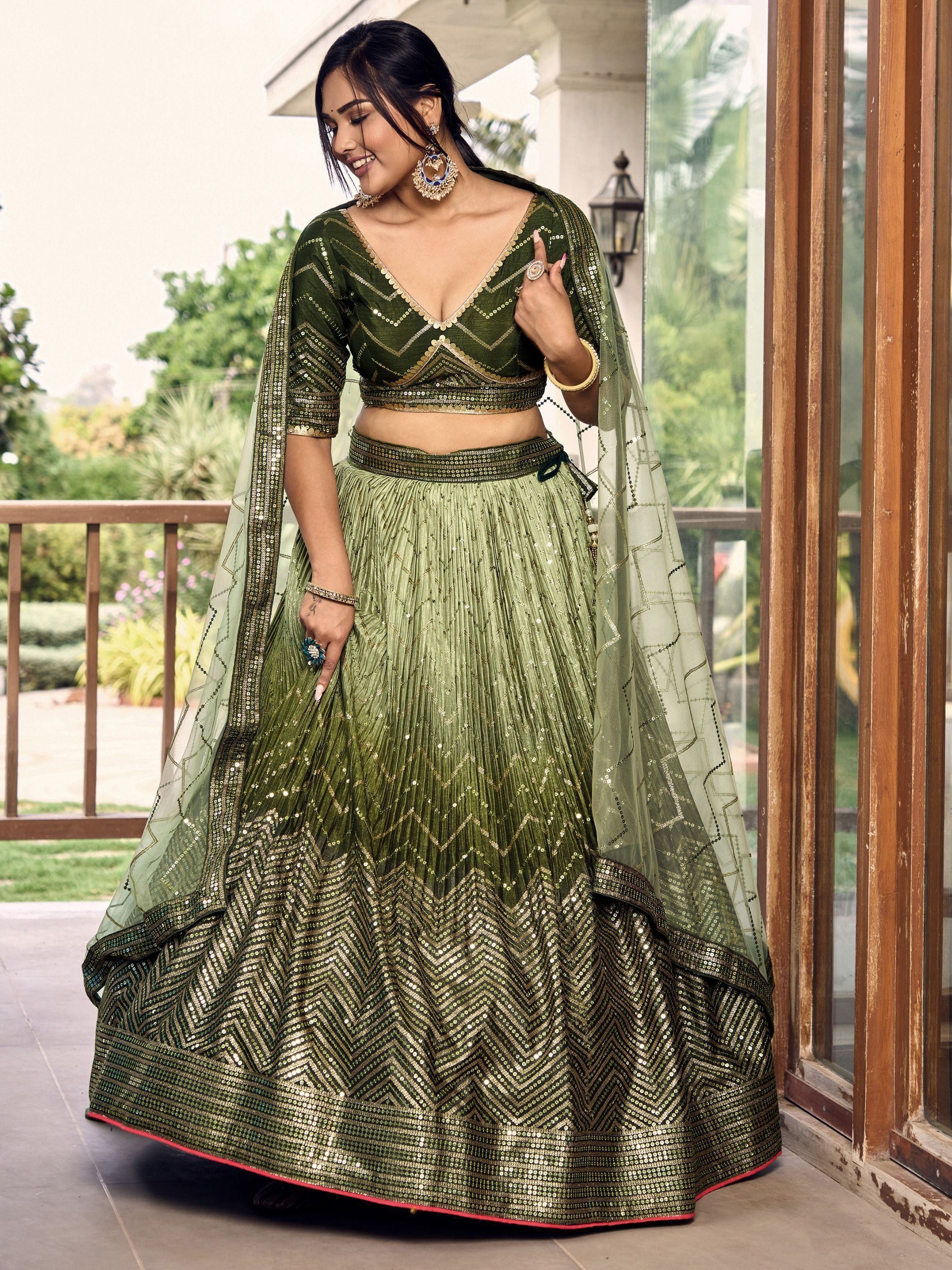 Olive green designer lehenga choli with gold sequin zigzag patterns, perfect for Indian ethnic wear events.