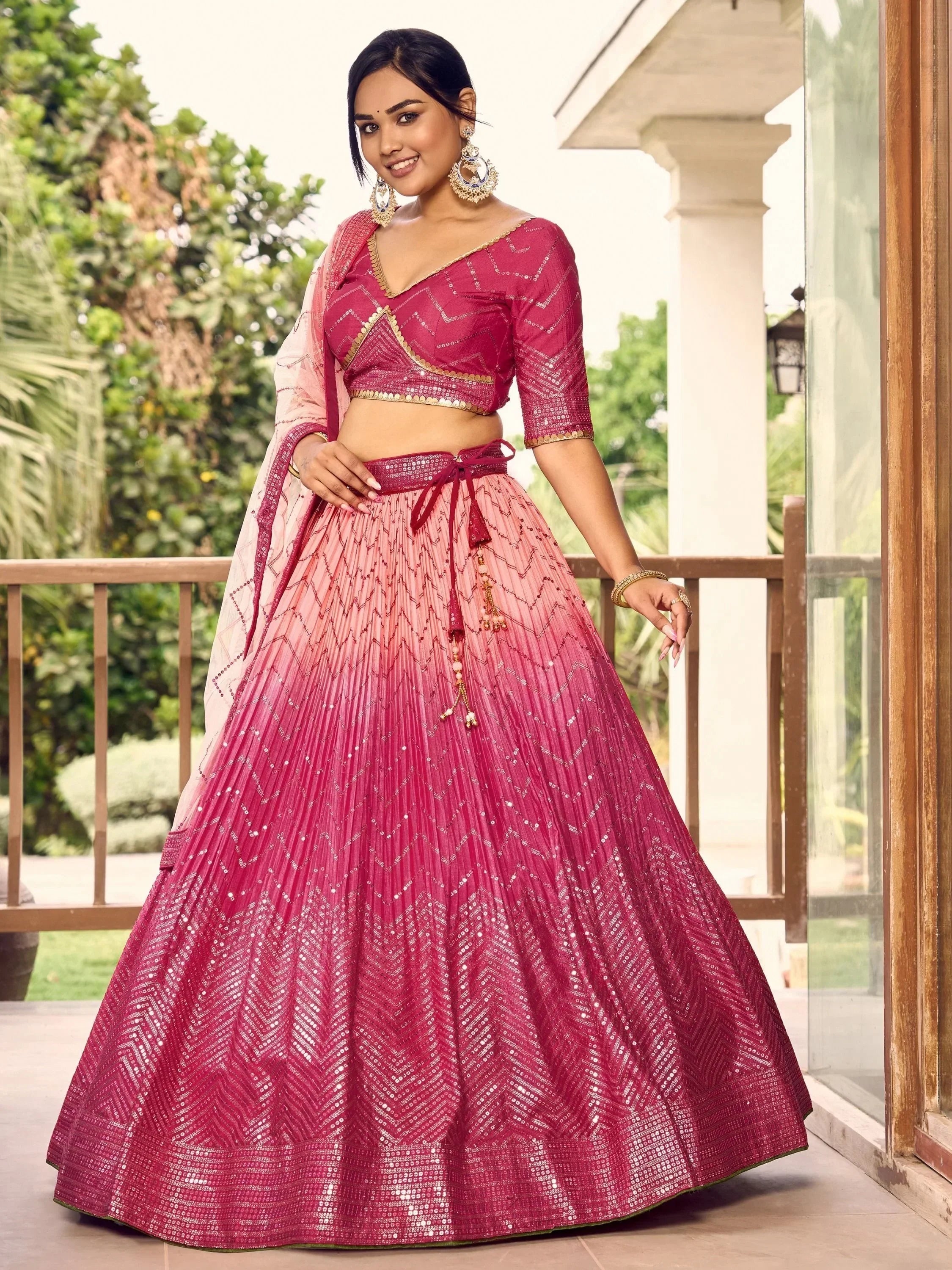 Pink sequin lehenga choli with gold embroidery, perfect for Indian weddings and festive occasions
