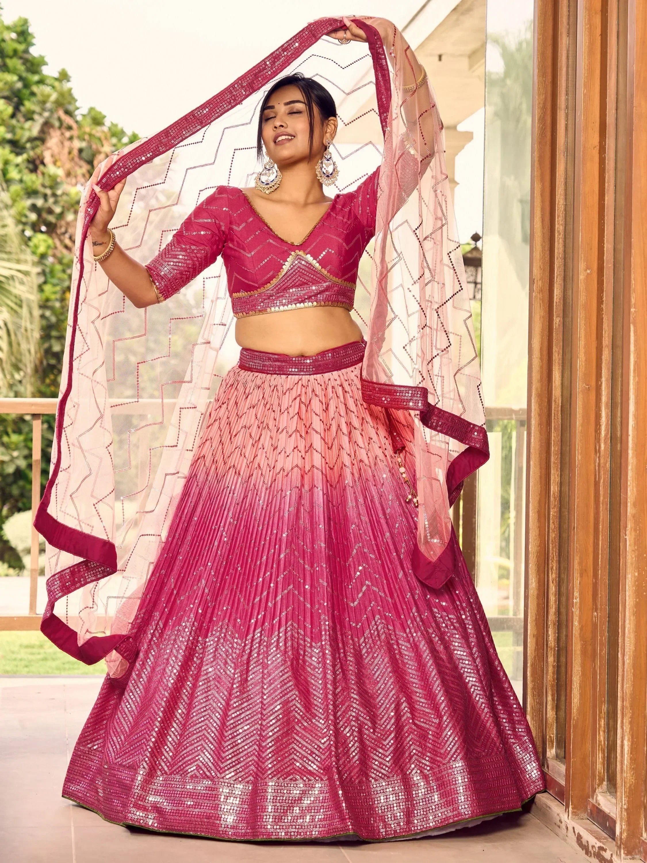 Elegant pink lehenga choli with sequin detailing, perfect for Indian ethnic wear events.