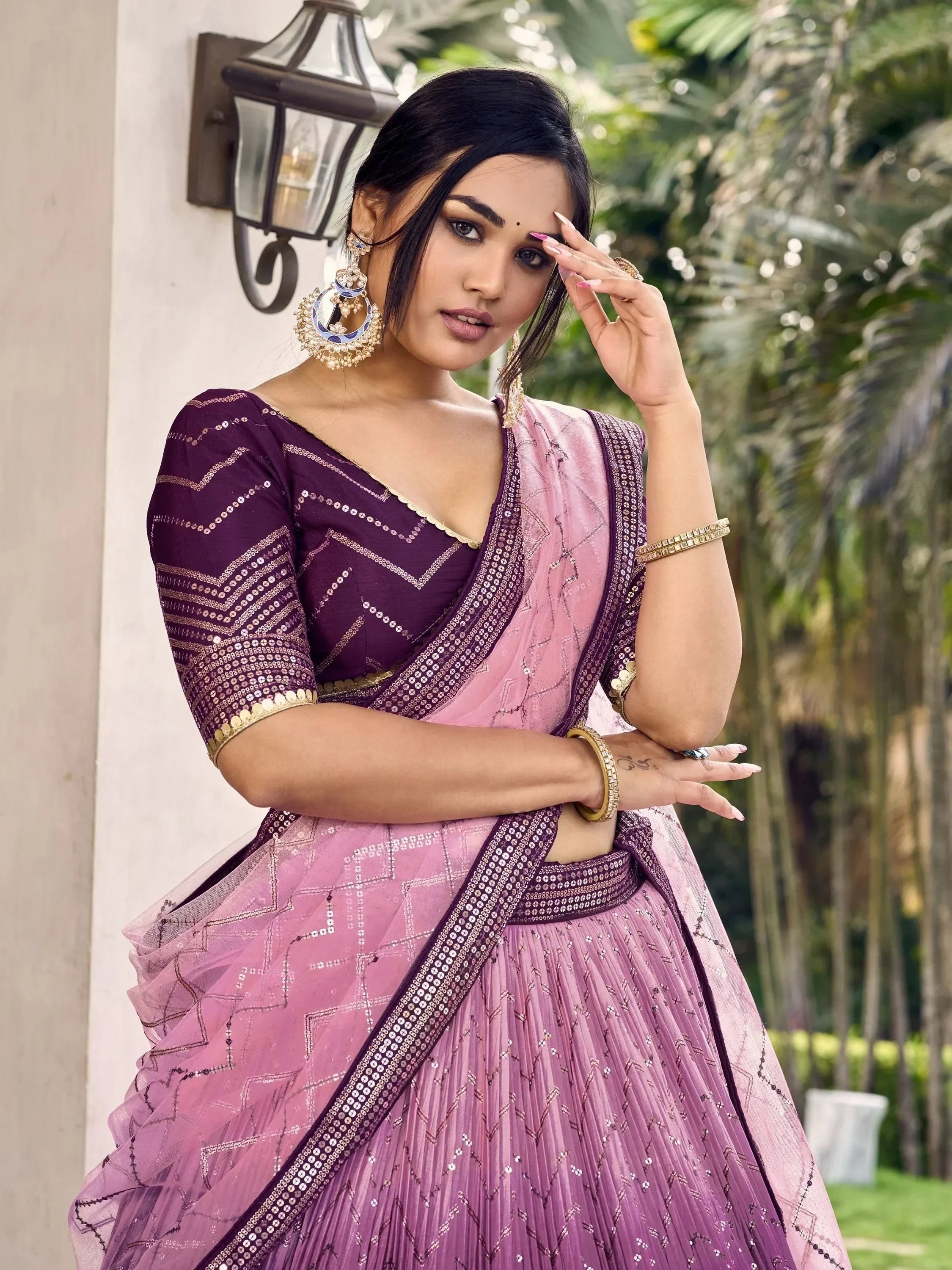 Purple and pink designer lehenga choli with sequin work, perfect for Indian ethnic wear occasions