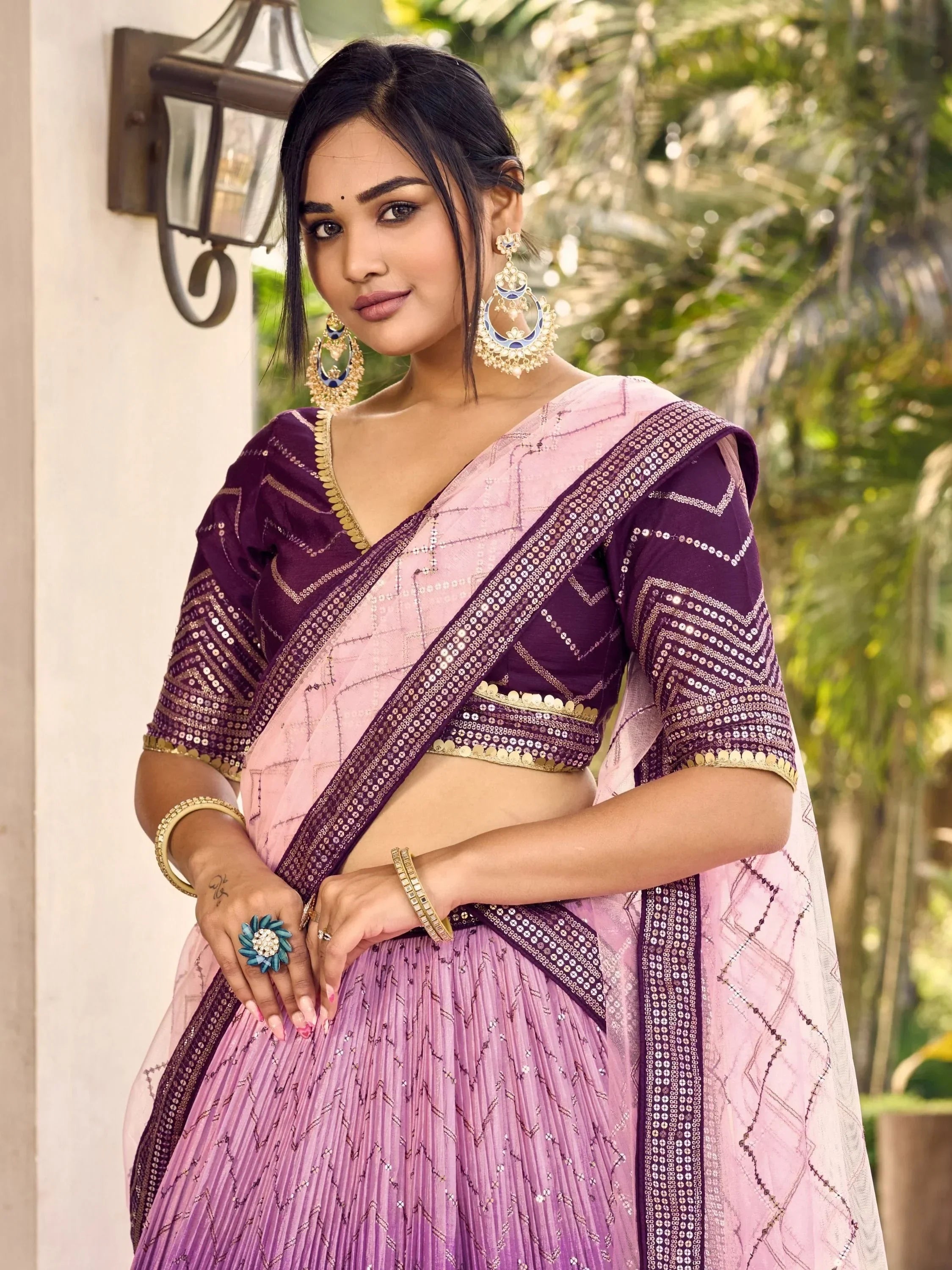 Purple and pink designer lehenga choli with sequin work, perfect for Indian ethnic wear occasions