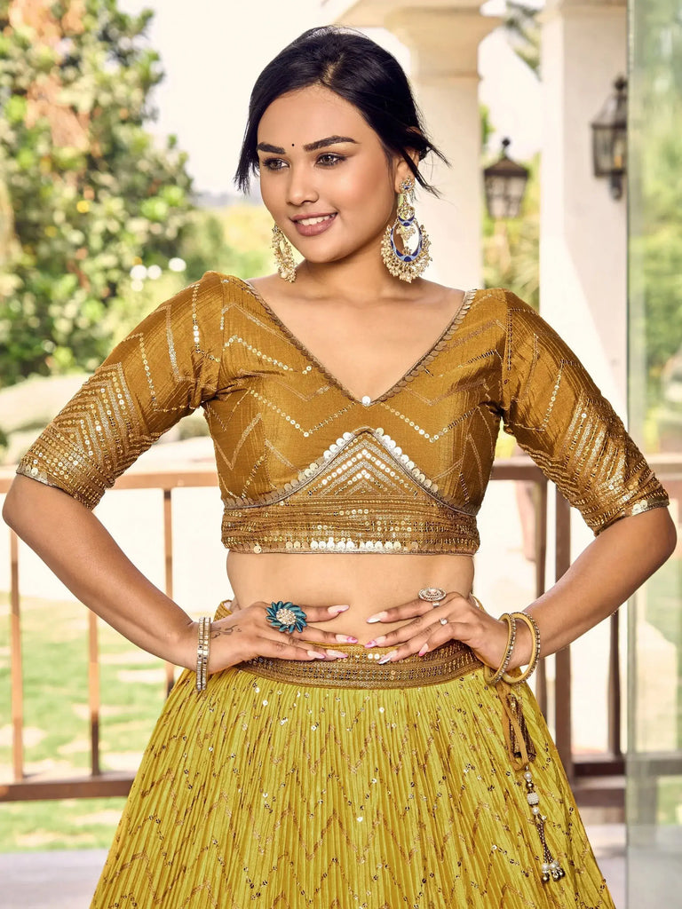 Outstanding Yellow Sequins Chinon Haldi Wear Lehenga Choli