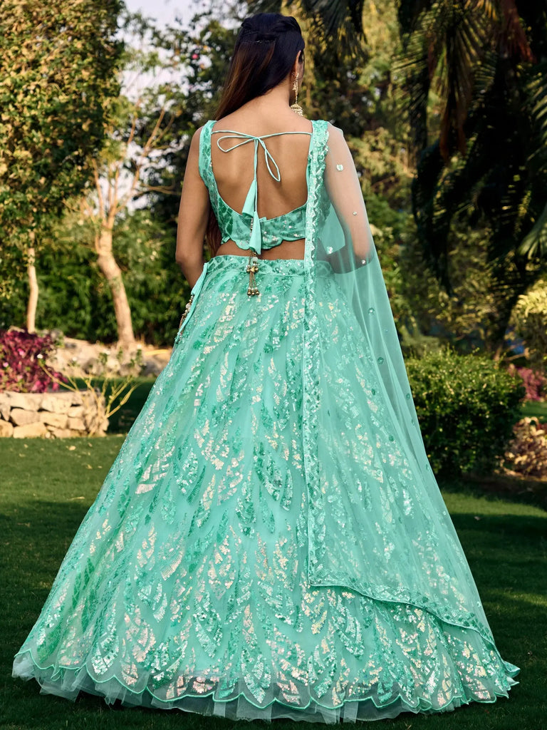 Fabulous Turquoise Sequins Net Engagement Wear Lehenga Choli