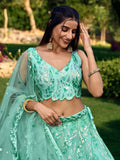 Fabulous Turquoise Sequins Net Engagement Wear Lehenga Choli