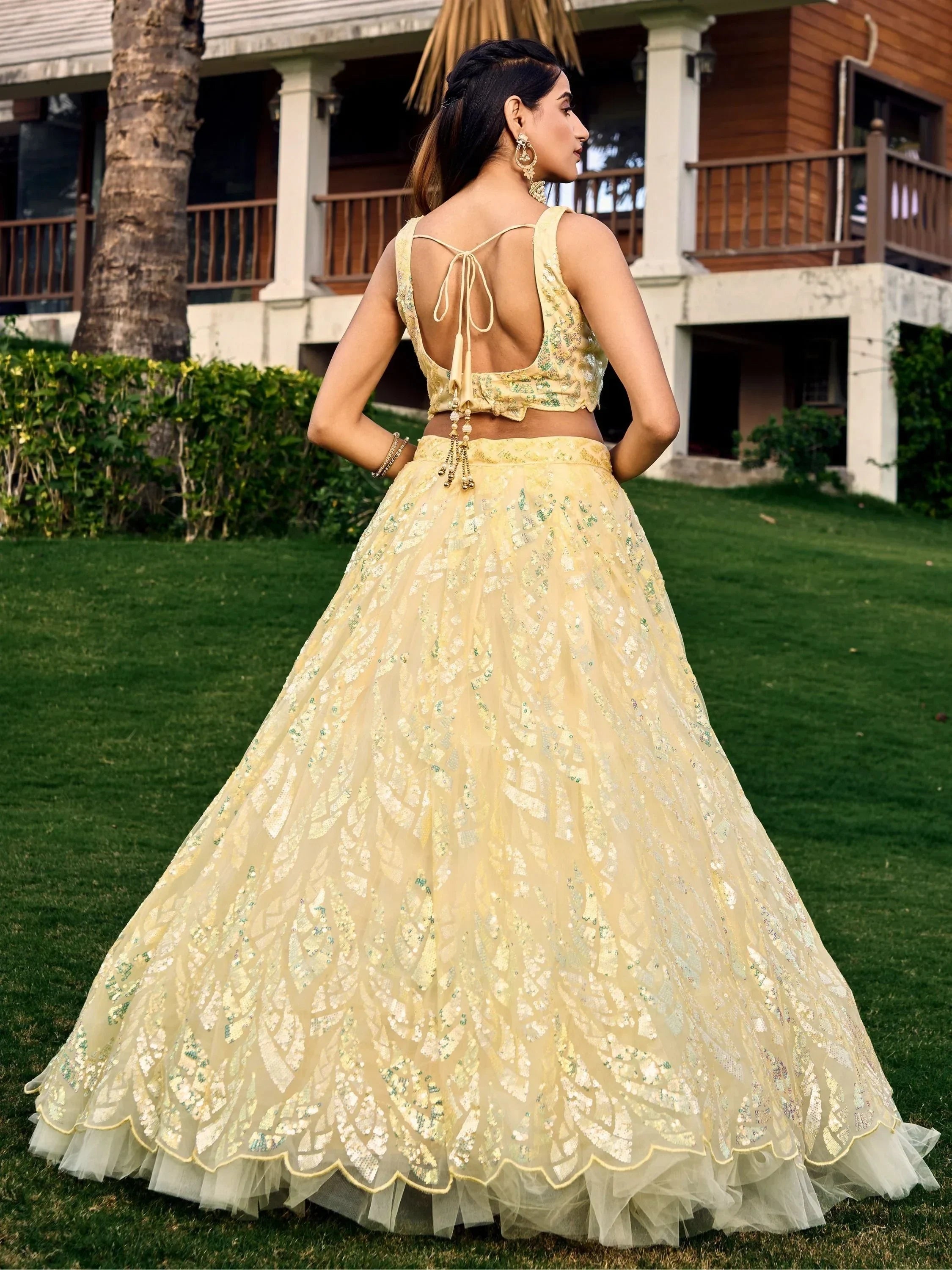 Yellow sequin lehenga choli with back tie blouse, perfect for Indian weddings and festive occasions
