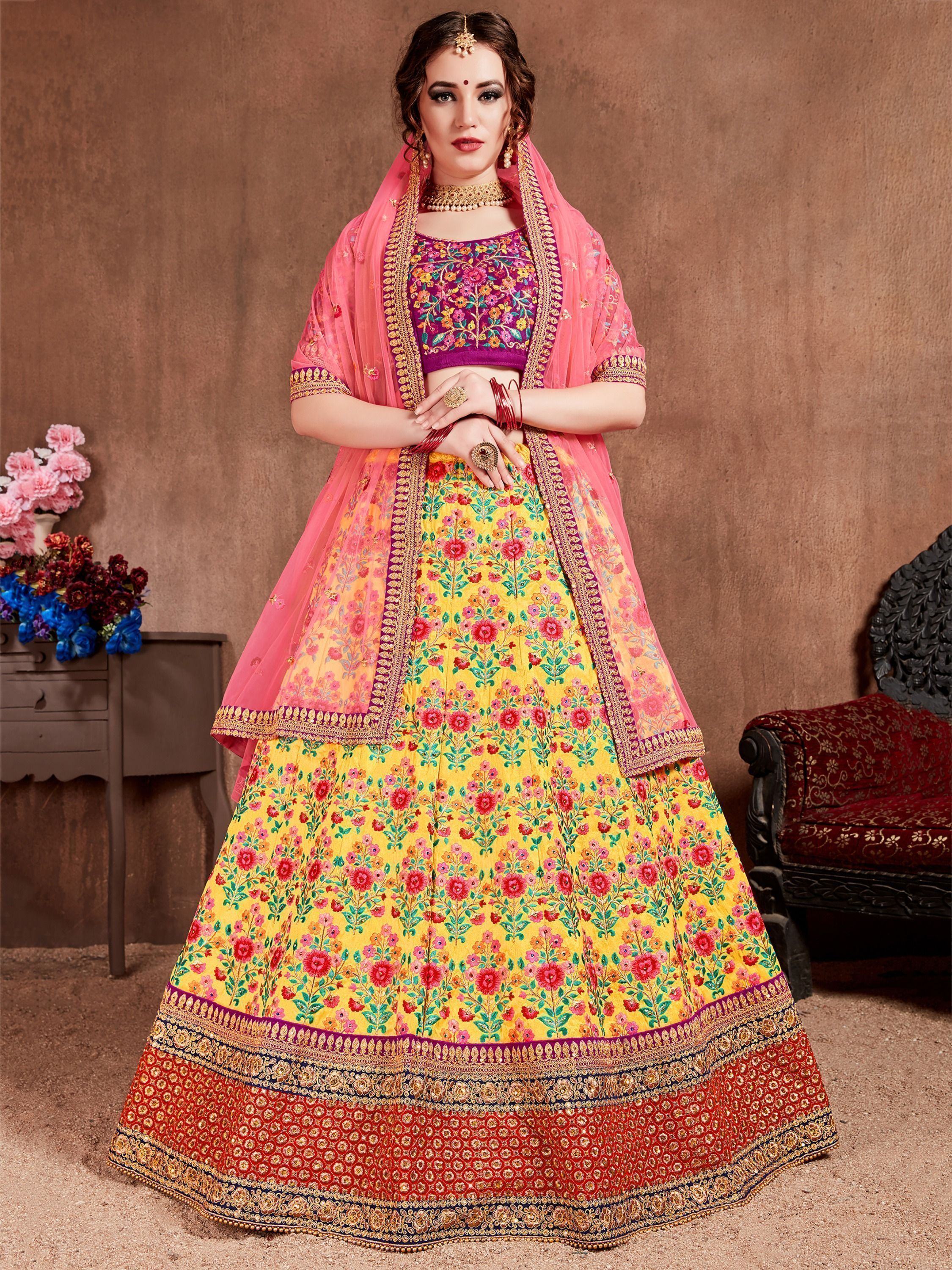 Vibrant floral lehenga choli with pink dupatta, perfect for Indian weddings and festive occasions