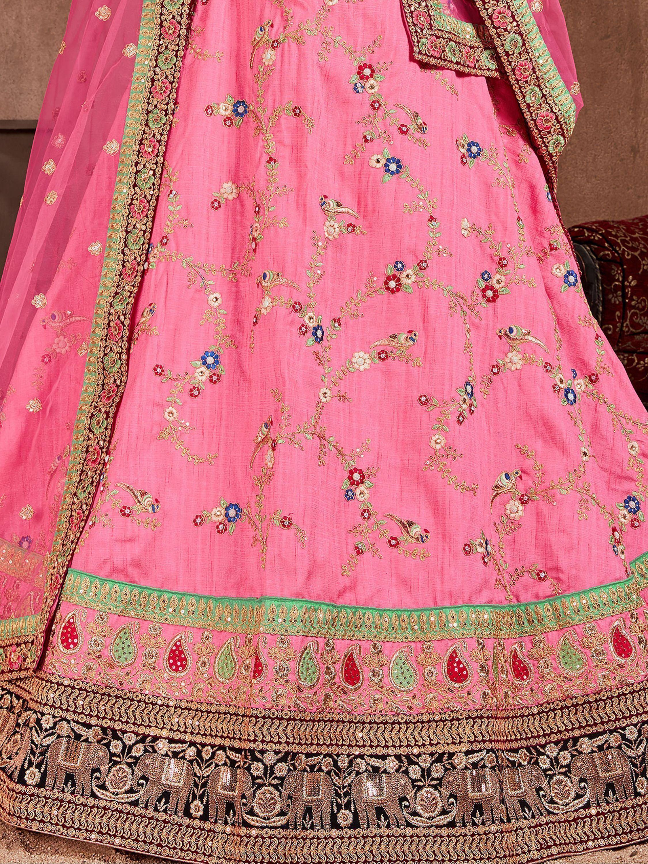 Pink designer lehenga with floral and bird embroidery, green border, and elephant motif hem