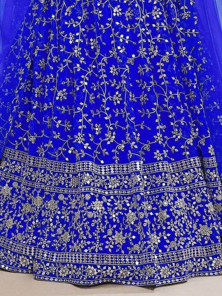 Mesmerizing Blue Sequins Georgette Wedding Wear Lehenga Choli