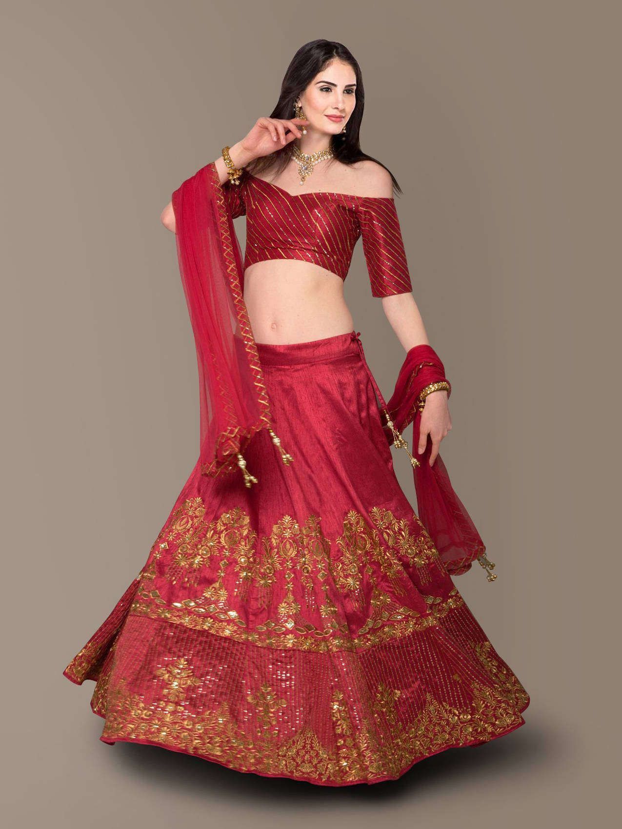 Flaunt your simple and pretty look with this hypnotic red colored lehenga choli