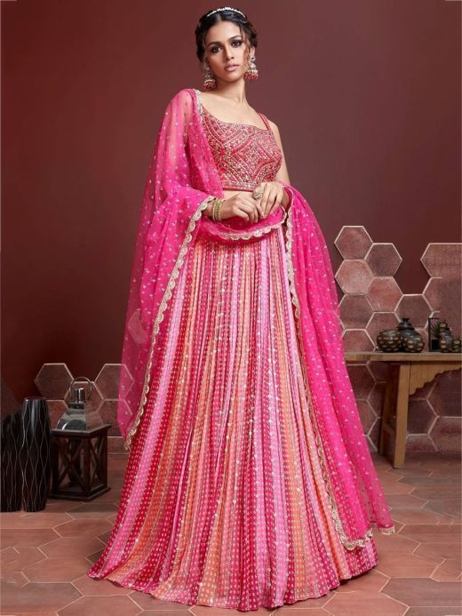 Buy Hot Pink Lehenga Choli In Net With Mirror Work In Floral And Mughal  Motifs Along With A Tassel Belt Online - Kalki Fashion