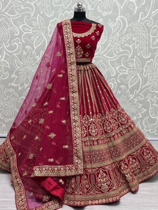 Ravishing Rani Pink Embroidered Velvet Bridal Wear Lehenga Choli