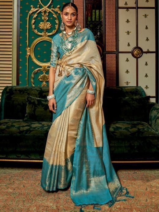Attractive Beige And Sky Blue Zari Weaving Kanjivaram Silk Saree 