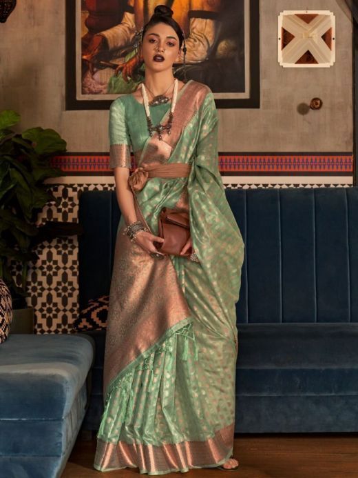 Capricious Sea Green Zari Weaving Silk Traditional Saree