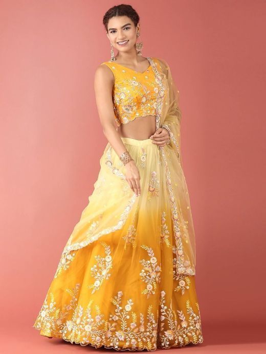 Elegant Yellow Embroidered Net Wedding Wear Lehenga choli