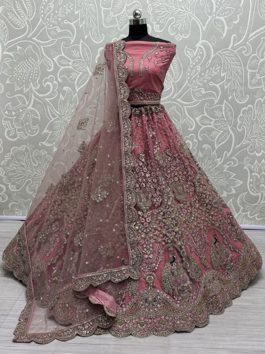 Enchanting Pink Sequins Net Engagement Wear Lehenga Choli
