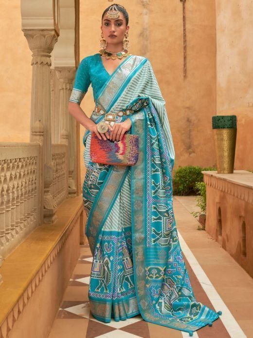 Attractive Teal Blue Patola Printed Silk Saree With Blouse