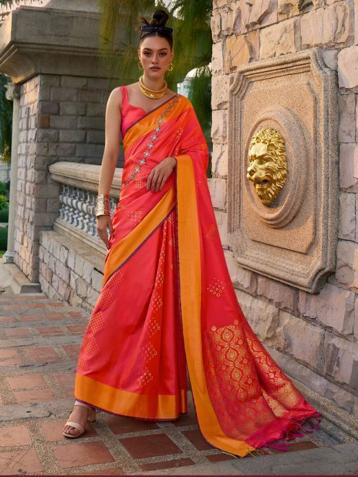Glamorous Coral Red Zari Weaving Silk Wedding Wear Saree