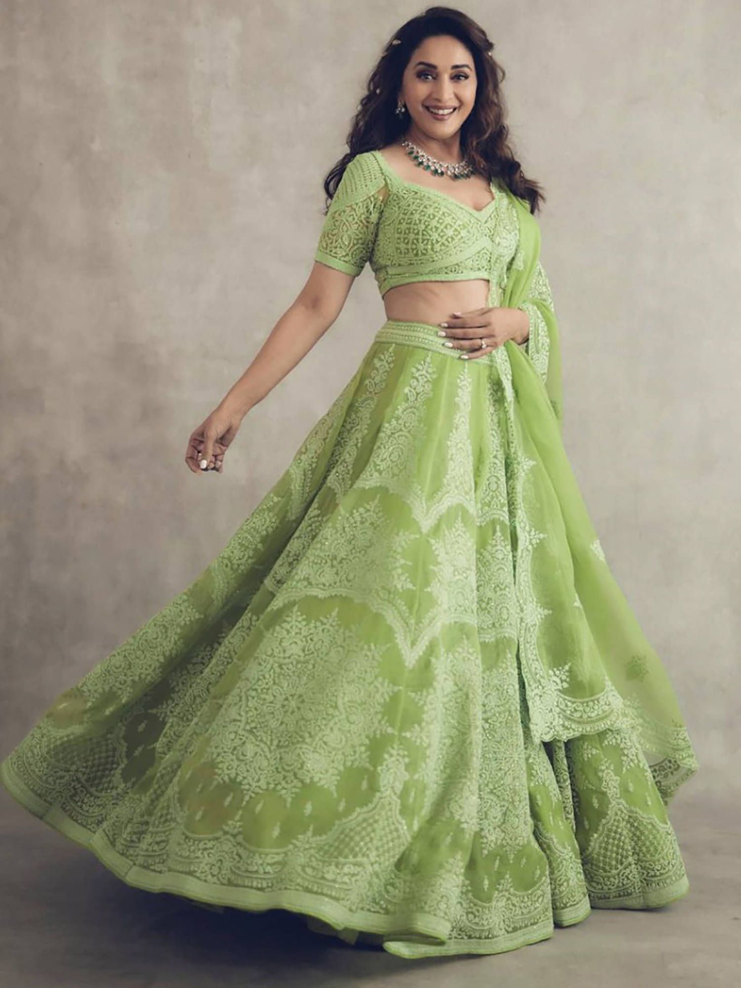 Madhuri Dixit Lime Green Net Wedding Wear Lehenga Choli