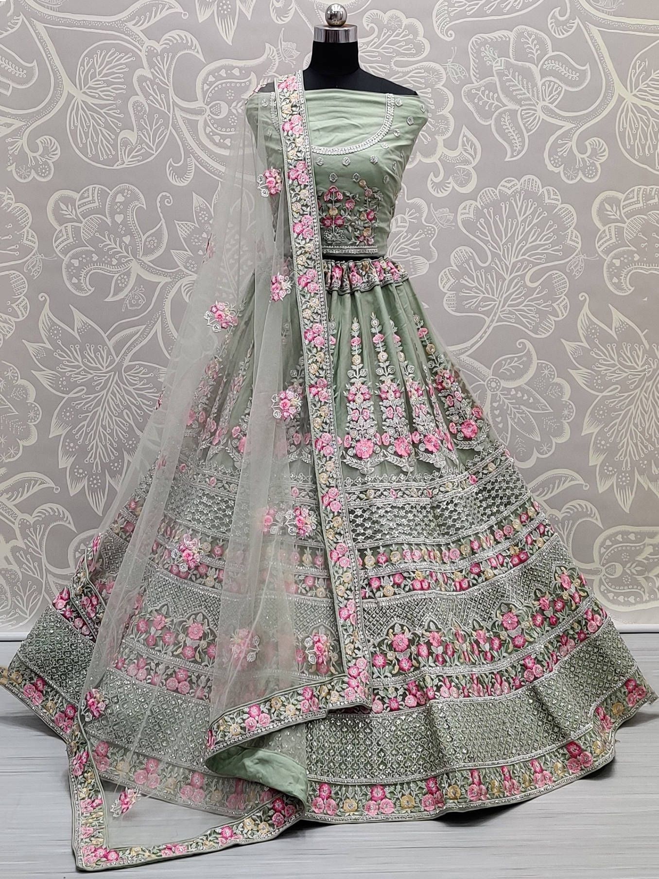 Pista Green Diamond Embroidered Net Wedding Wear Lehenga Choli