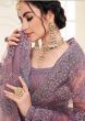 Violet Embroidered Net Wedding Wear Lehenga Choli 