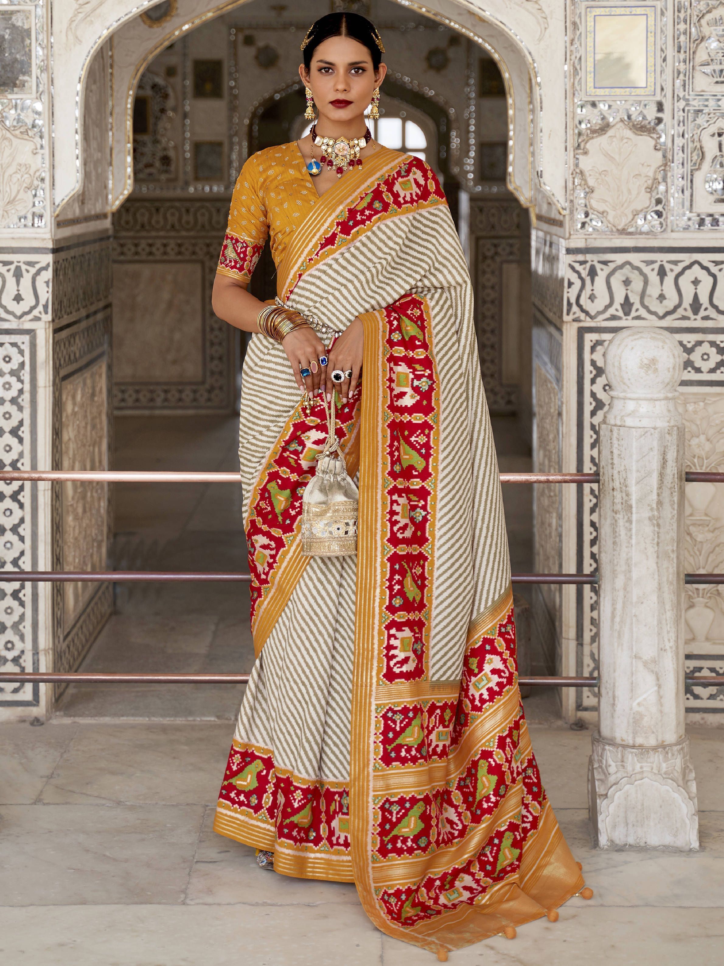 Raising Yellow Weaving Patola Silk Wedding Wear Saree