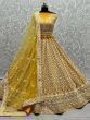 Stunning Yellow Thread Embroidered Net Lehenga Choli