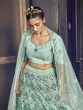 Blue Sequins Embroidered Net Party Wear Lehenga Choli