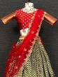 Green Banarasi Silk Wedding Wear Lehenga Choli With Net Dupatta
