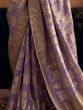 Mesmerizing Lavender Zari Woven Dola Silk Reception Wear Saree 
