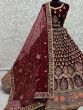 Ravishing Maroon Zari Work Velvet Bridal Wear Lehenga Choli