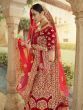 Red Stone Embroidered Pure Velvet Bridal Wear Lehenga Choli With Dupatta