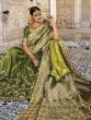 Stuning Green Embroidered Silk Wedding Wear Saree