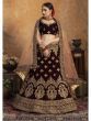 Maroon Zari Embroidered Velvet Wedding Wear Lehenga Choli With Peach Dupatta