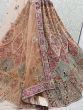 Fascinating Orange Patch Work Net Bridal Wear Lehenga Choli