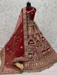 Appealing Maroon Zari Embroidery Velvet Bridal Wear Lehenga Choli