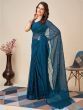 Fascinating Teal Blue Sequins Georgette Reception Wear Saree