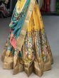 Impressive Yellow Kalamkari Printed Dola Silk Traditional Lehenga Choli