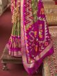 Lovely Green & Pink Patola Printed Silk Saree With Tassels On Pallu