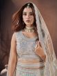 Fantastical Off-White Sequins Net Engagement Wear Lehenga Choli