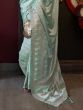 Alluring Turquoise Zari Weaving Satin Festival Wear Saree With Blouse