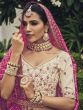 Enchanting Off-White Embroidered Silk Wedding Wear Lehenga Choli 