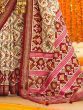Marvelous Cream & Maroon Patola Printed Silk Traditional Saree
