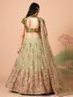 Impressive Pista Green Net Embroidered Wedding Lehenga Choli