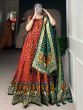 Astonishing Red Patola Printed Silk Festival Wear Gown With Dupatta