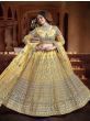 Fascinating Yellow Sequins Embroidered Net Wedding Wear Lehenga Choli 