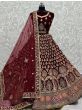 Ravishing Maroon Zari Work Velvet Bridal Wear Lehenga Choli